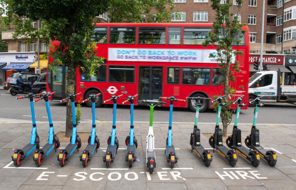 <p>General view of E-Scooters operated by Dott, Lime and Tier at an E-Scooter hire point in Kensington, west London Picture date: Tuesday June 29, 2021.</p>
