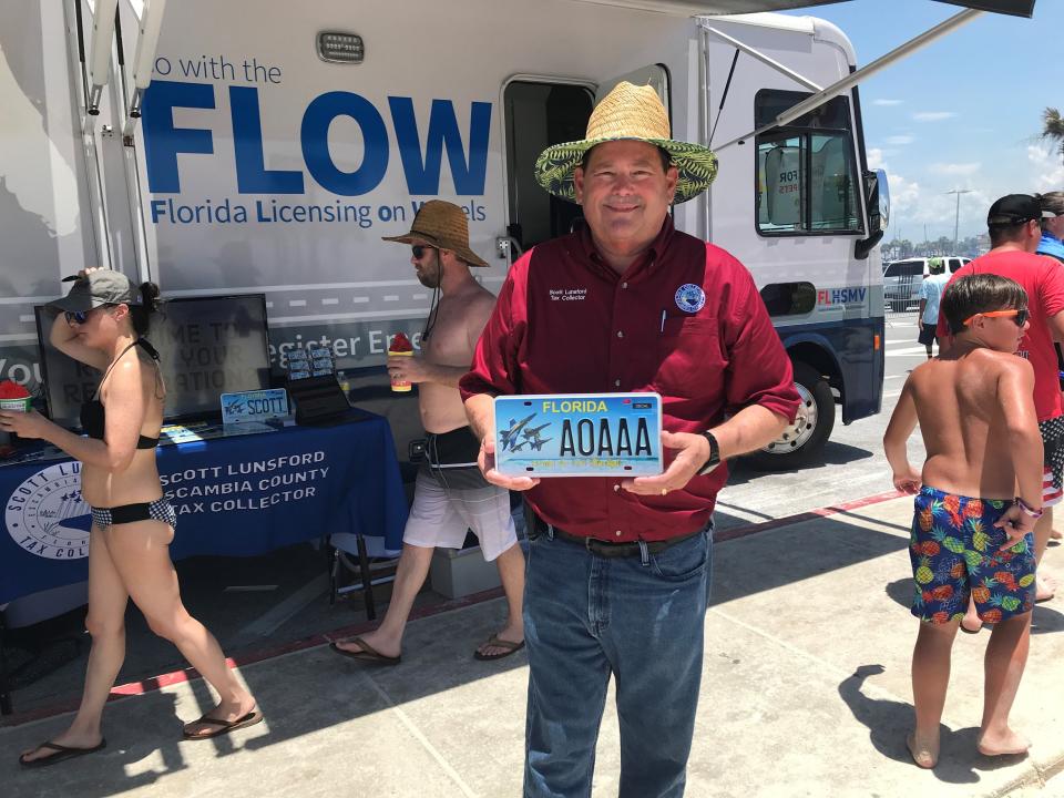 Escambia County Tax Collector Scott Lunsford was on hand Saturday, July 9, 2022, to show off the Blue Angels license plate available to Florida drivers.