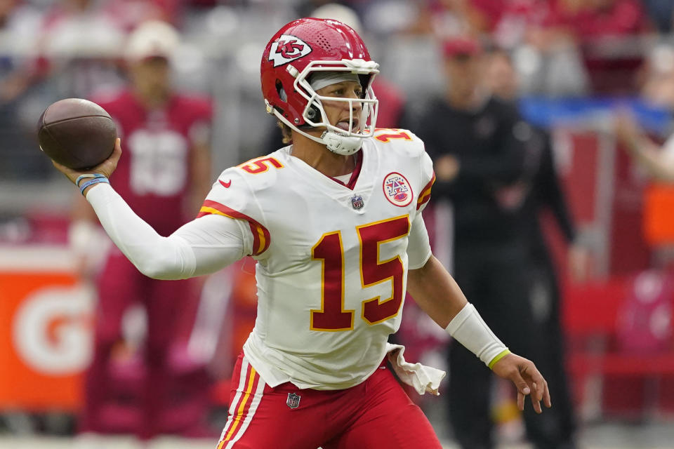 Kansas City Chiefs quarterback Patrick Mahomes (15) throws against the Arizona Cardinals during the first half of an NFL football game, Sunday, Sept. 11, 2022, in Glendale, Ariz. (AP Photo/Matt York)