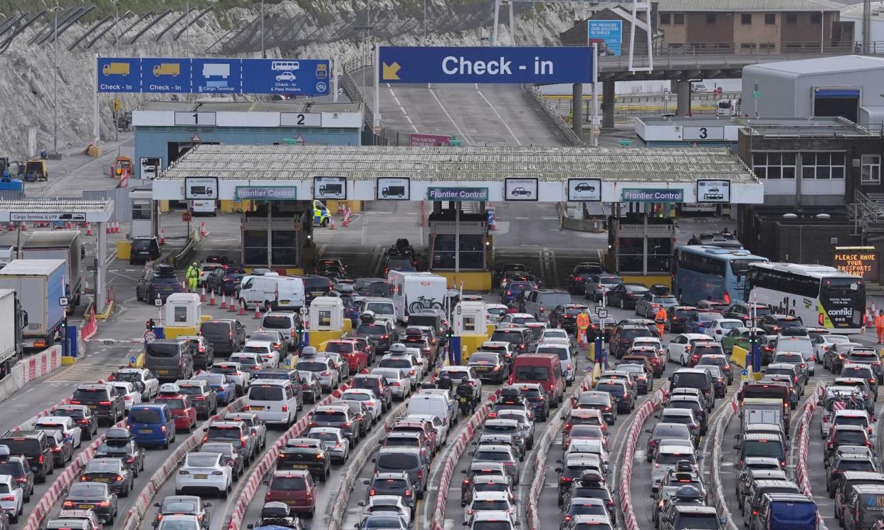 <span>Passengers queue for ferries at the Port of Dover, which has confined space due to the white cliffs nearby.</span><span>Photograph: Gareth Fuller/PA</span>