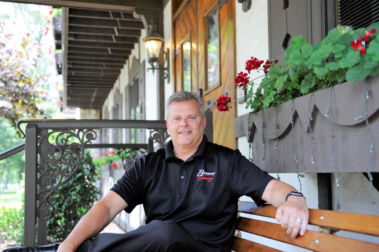 Jim Bauer, current owner and president of The Bauerhaus, sits outside the building on Thursday, June 22, 2023.