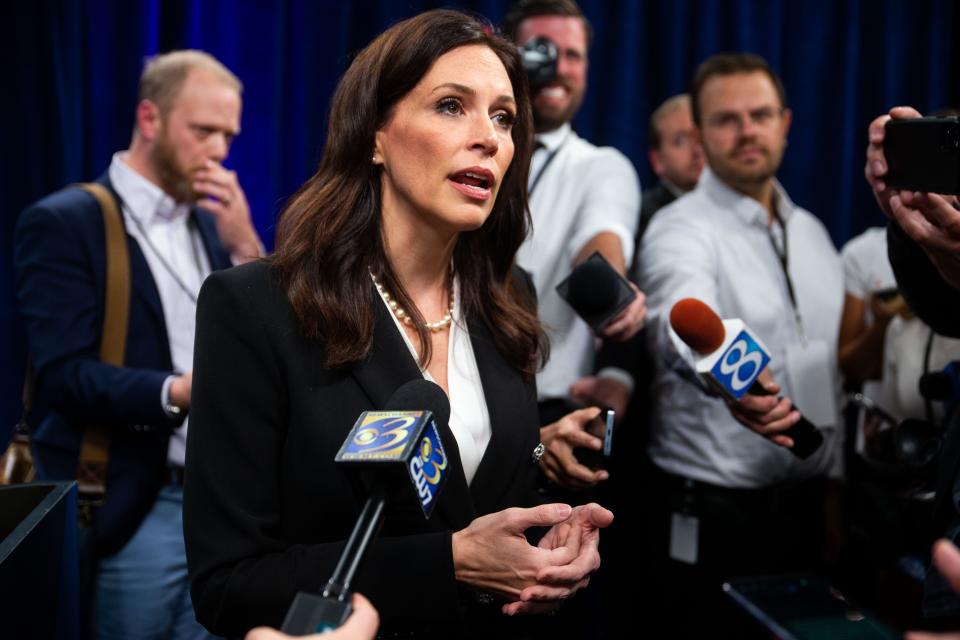 Tudor Dixon takes questions from the media following the first debate against Gov. Gretchen Whitmer Thursday, Oct. 13, 2022, in Grand Rapids. 