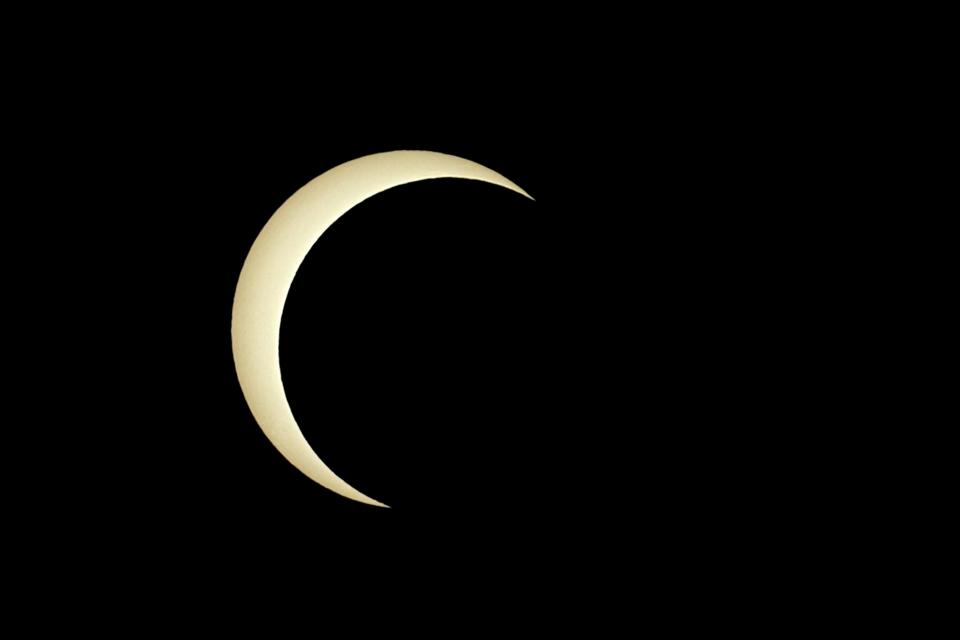 The annular solar eclipse is seen from Richardson, Texas, Saturday, Oct. 14, 2023.