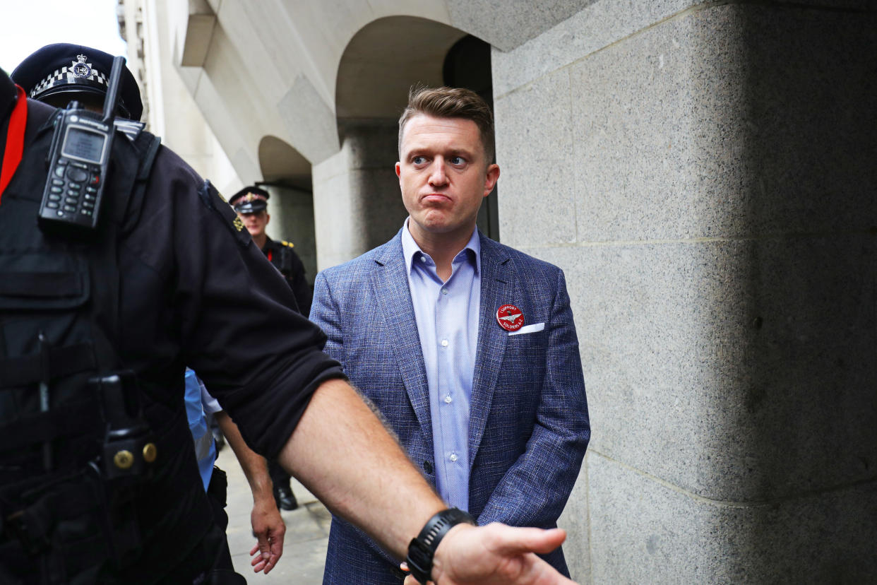 Tommy Robinson outside the Old Bailey in London after being found in contempt of court by High Court judges for filming defendants in a criminal trial and broadcasting the footage on social media.