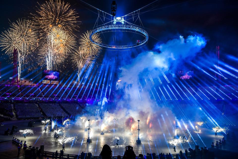 <p>A firework display is seen during the opening ceremony of the Pyeongchang 2018 Winter Olympic Games at the Pyeongchang Stadium on February 9, 2018. / AFP PHOTO / POOL AND AFP PHOTO / Jonathan NACKSTRAND </p>