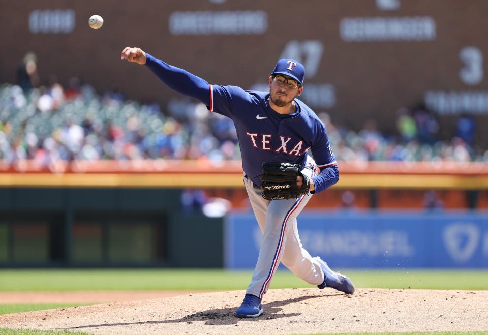 Dane Dunning of the Texas Rangers throws a first-inning pitch against the Detroit Tigers at Comerica Park on May 31, 2023 in Detroit, Michigan.