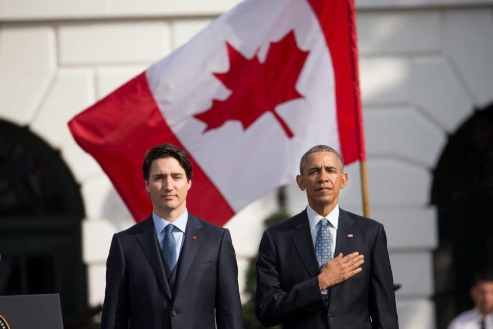 President Barack Obama and Canadian Prime Minister Justin Trudeau, stand for the playing of national anthems during an arrival ceremony on the South Lawn of the White House in Washington, Thursday, March 10, 2016. (AP Photo/Andrew Harnik)