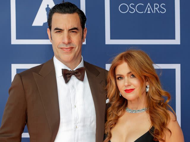 <p>Rick Rycroft-Pool/Getty</p> Sacha Baron Cohen and Isla Fisher at a screening of the Oscars in 2021
