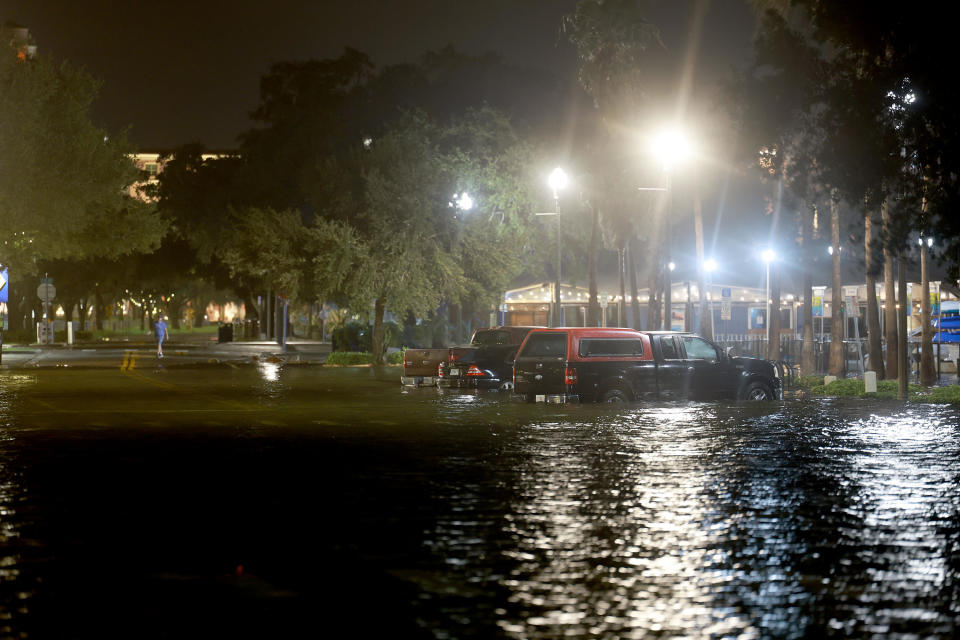 Vehicles on a street flooded by Hurricane Idalia on August 30, 2023 in St. Petersburg, Florida.  / Credit: Getty Images