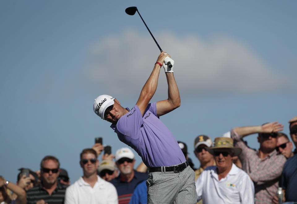 Justin Thomas hits from the 10th tee during the second round of the Phoenix Open PGA golf tournament, Friday, Feb. 1, 2019, in Scottsdale, Ariz. (AP Photo/Matt York)
