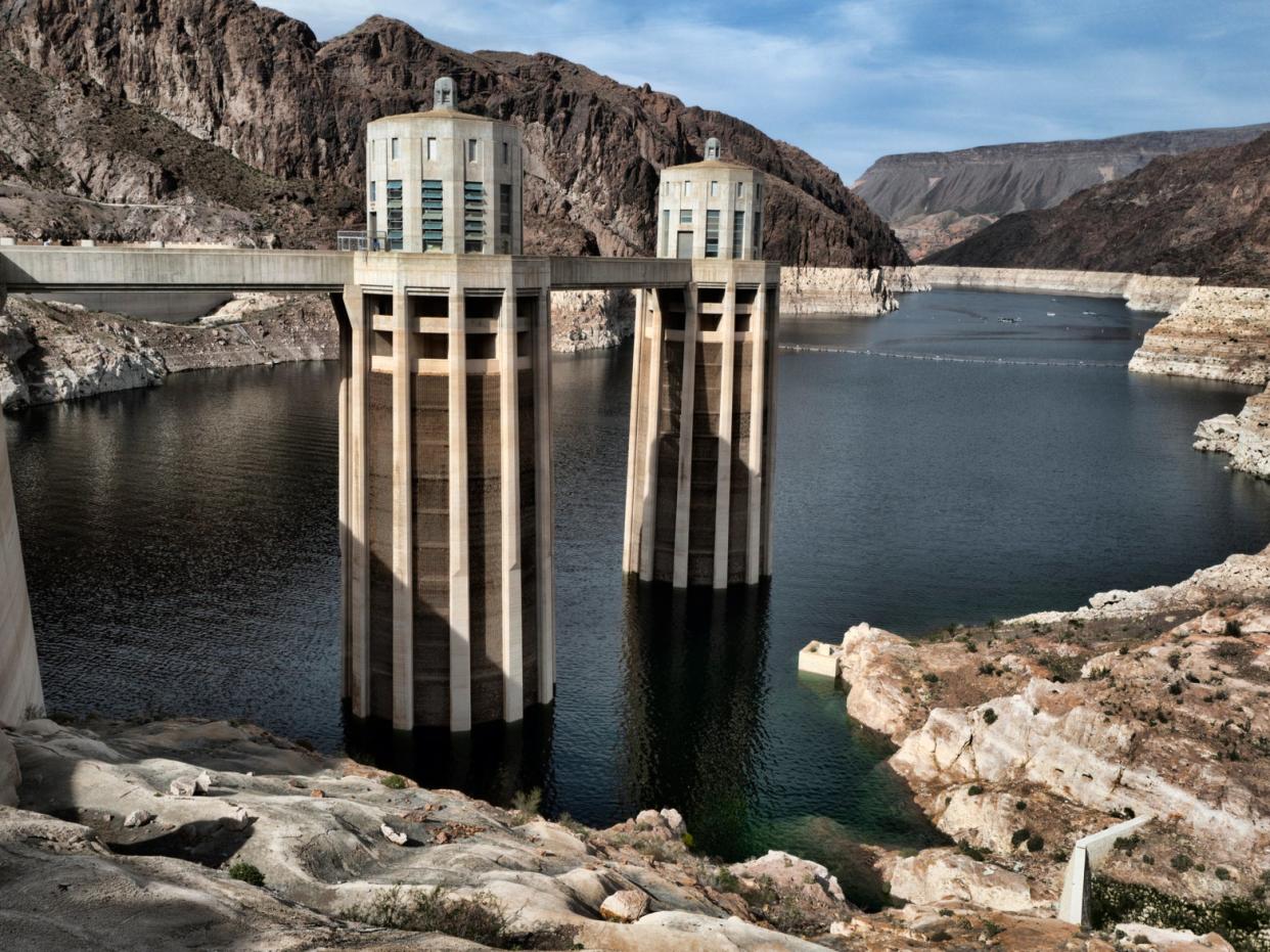 A March 2019 photo shows a bathtub ring of light minerals showing the high-water mark of the reservoir which has shrunk to its lowest point on the Colorado River, as seen from the Hoover Dam, Arizona  (AP Photo/Richard Vogel,File)