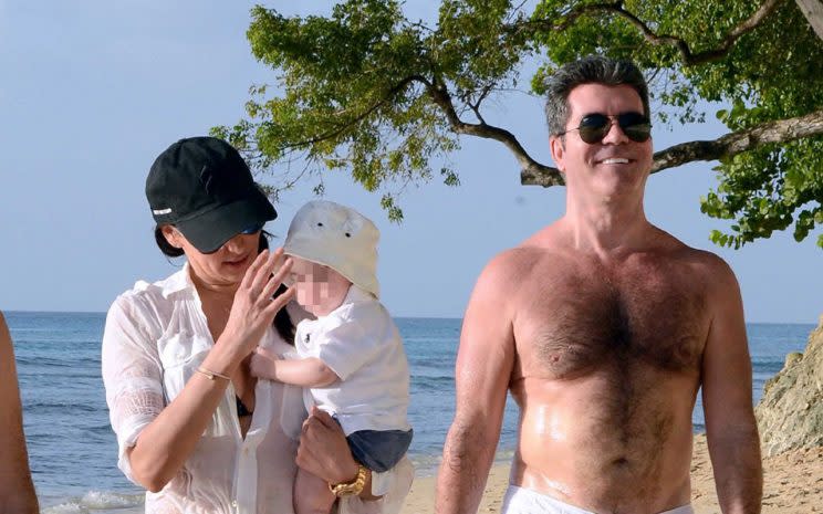 Simon Cowell and Lauren Silverman/Rex Photos