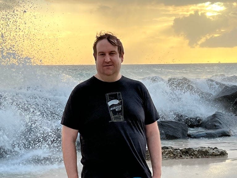 man posing on beach in Canouan freelancer photo