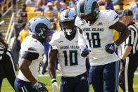 Rhode Island running back Marques DeShields (10) celebrates with wide receivers Kahtero Summers (18) and Ed Lee (13) after scoring a touchdown against Pittsburgh during the first half of an NCAA college football game, Saturday, Sept. 24, 2022, in Pittsburgh. (AP Photo/Keith Srakocic)