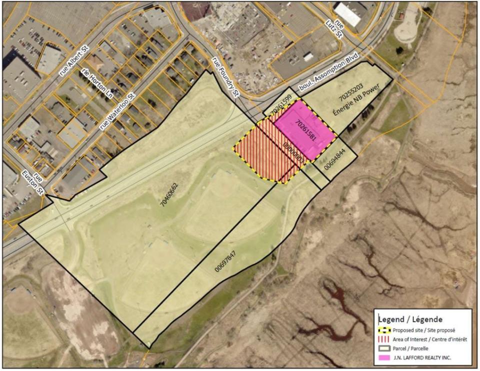 A map showing the land, marked with red lines, the city is selling to the developer which already owns the property in pink. 