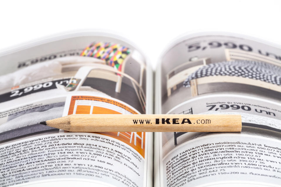 Songkhla, Thailand - January 27, 2015: Ikea pencil placed between the central ridge of the Ikea catalog walleye edition Thailand . Ikea Founded in Sweden in 1943, Ikea is the world's largest furniture retailer.