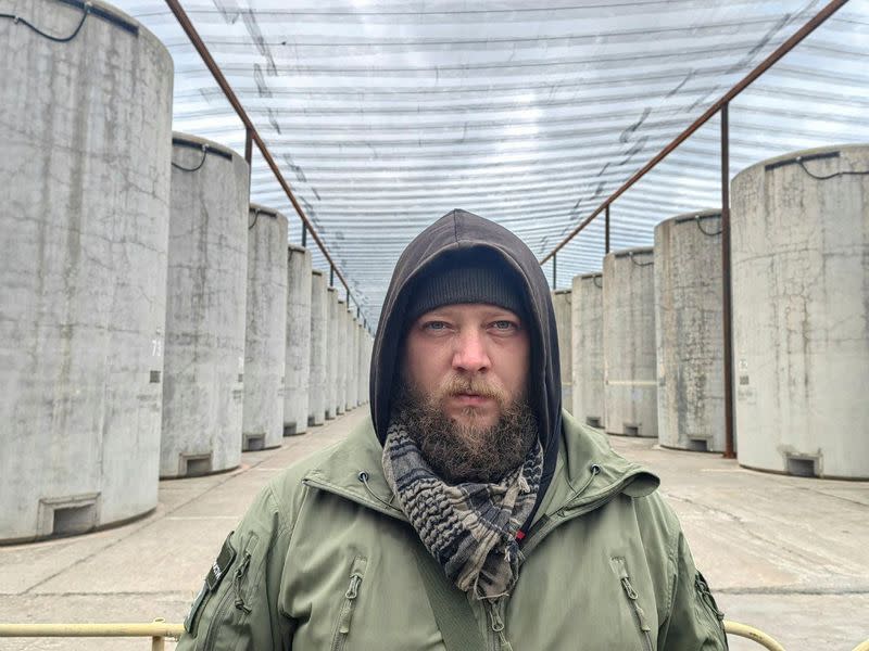 RIA correspondent Rostislav Zhuravlev poses for a picture at an unknown location