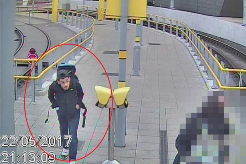 Handout file photo issued by Greater Manchester Police of the CCTV image of Salman Abedi at Victoria Station making his way to the Manchester Arena on May 22, 2017, where he detonated his bomb (PA Media)