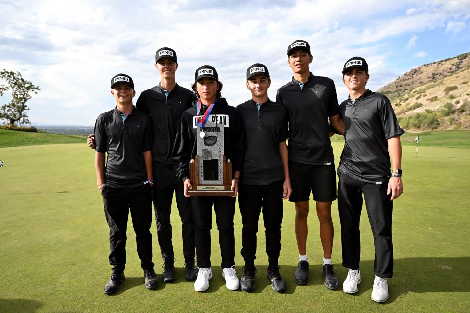 Lone Peak golfers pose with their second place trophy in 6A Golf at Old Mill Golf Course in Holladay on Tuesday, Oct. 10, 2023. | Scott G Winterton, Deseret News