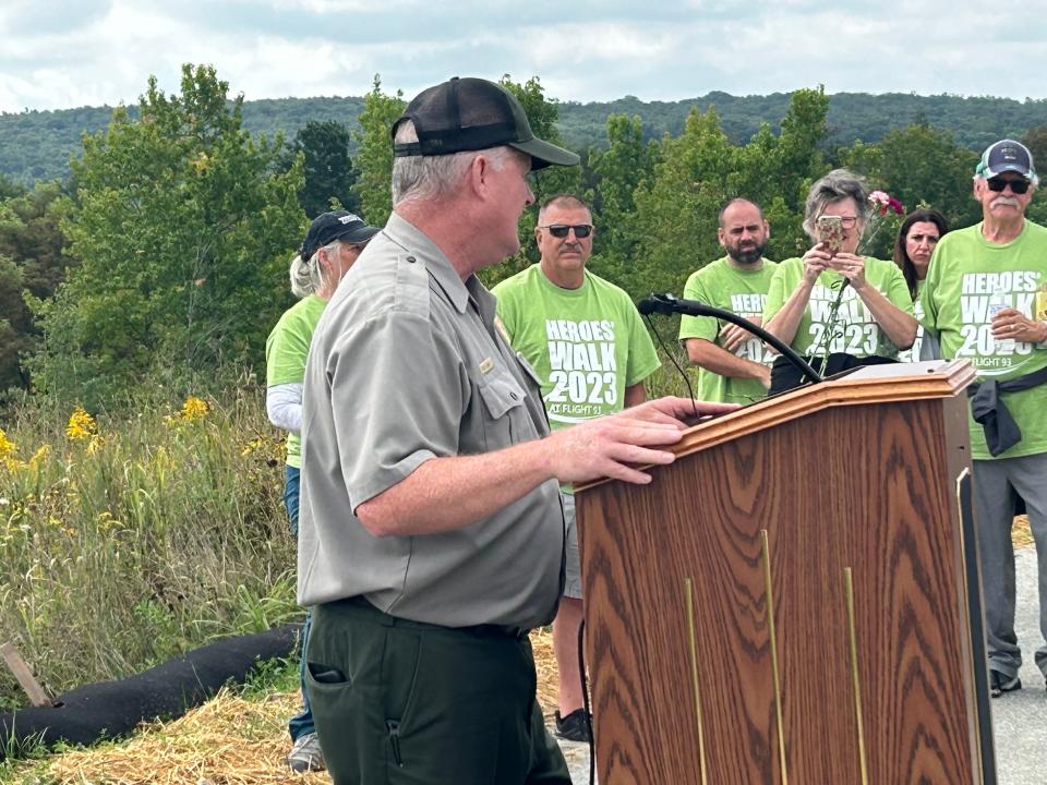 Flight 93 National Memorial Superintendent Stephen Clark makes an announcement for the first time at the Heroes Walk Monday about a new project.