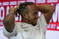 Mercedes driver Lewis Hamilton of Britain gestures during a news conference at the Monaco racetrack, in Monaco, Thursday, May 25, 2023. The Formula one race will be held on Sunday. (AP Photo/Luca Bruno)