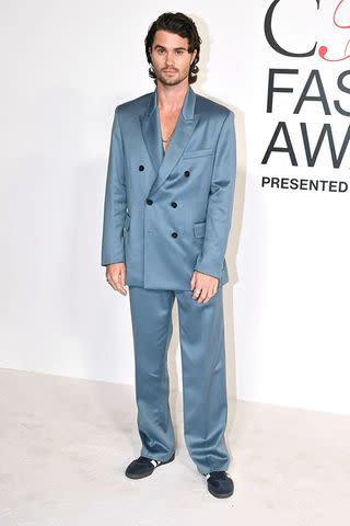 <p>Bryan Bedder/WWD via Getty</p> Chase Stokes at the 2023 CFDA Fashion Awards