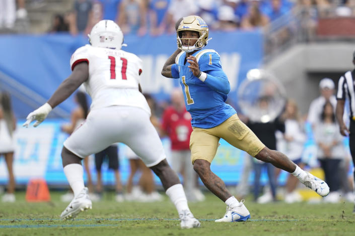 UCLA quarterback Dorian Thompson-Robinson (1) throws against South Alabama defensive lineman Jamie Sheriff (11) during the first half of an NCAA college football game in Pasadena, Calif., Saturday, Sept. 17, 2022. (AP Photo/Ashley Landis)