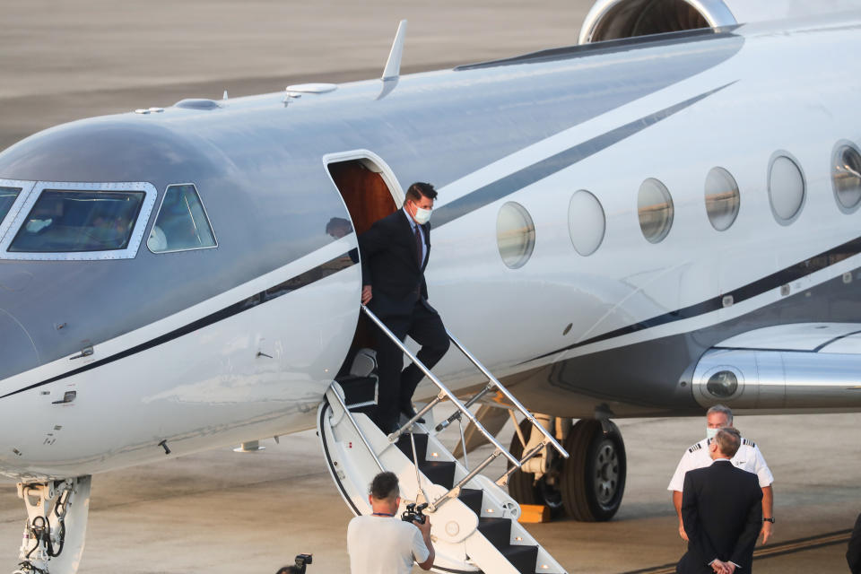 U.S. Under Secretary of State Keith Krach exits a plane upon arrival at the air force base airport in Taipei. Taiwan on Thursday, Sept. 17, 2020. Krach is in Taiwan on Thursday for the second visit by a high-level American official in two months, prompting a stern warning and threat of possible retaliation from China. (Pool Photo via AP Photo)