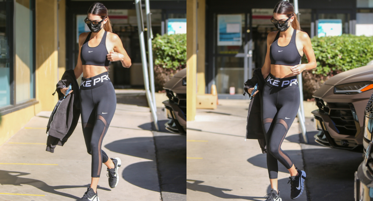 Kendall Jenner street style. Nike leggings, sports bra and a