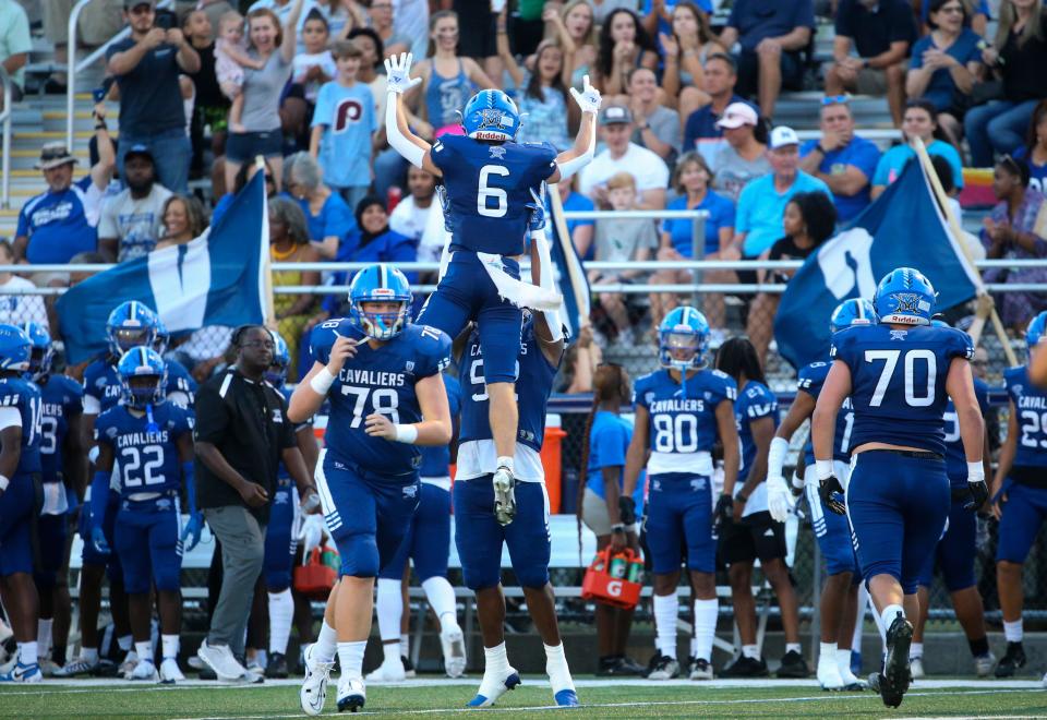 Middletown's Matt Priestley (6) celebrates a touchdown reception to open the scoring in the first half of the Cavaliers' 41-7 win against against Sussex Central at Cavaliers Stadium, Friday, Sept. 8, 2023.