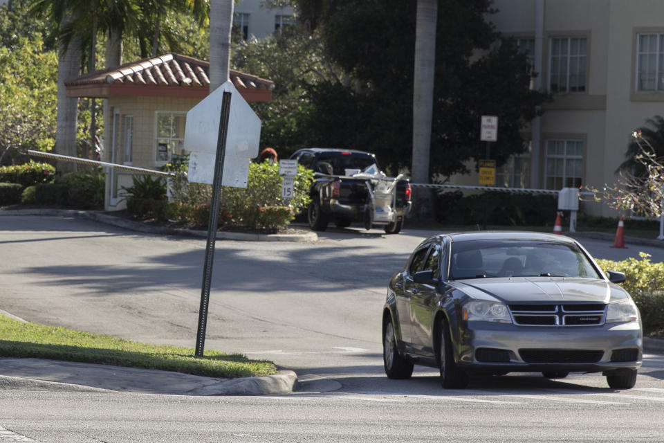 A cars drives out of MorseLife Health System in West Palm Beach, Fla., on Wednesday, Jan. 6, 2021. Florida launched an investigation Wednesday into the upscale nursing home amid reports that it administered coronavirus vaccines to wealthy donors and members of a country club along with its residents and employees. ( (AP Photo/Cody Jackson)