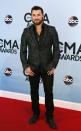 Tyler Farr poses on arrival at the 47th Country Music Association Awards in Nashville, Tennessee November 6, 2013. REUTERS/Eric Henderson (UNITED STATES - Tags: ENTERTAINMENT)