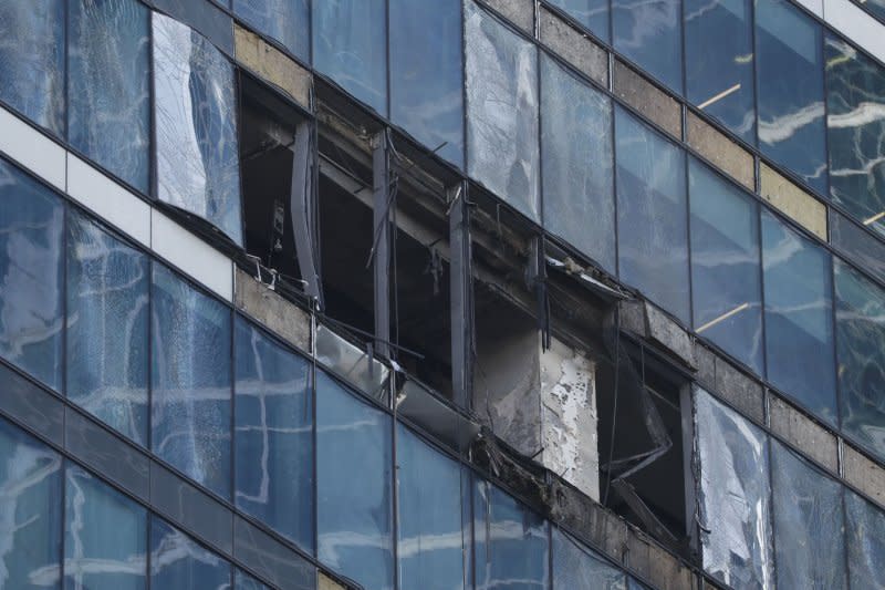 The aftermath of a drone raid on Moscow early Tuesday in which authorities said an office tower was damaged for the second since Sunday by an unmanned aerial vehicle after it was jammed by electronic warfare systems. Photo by Yuri Kochetkov/EPA-EFE