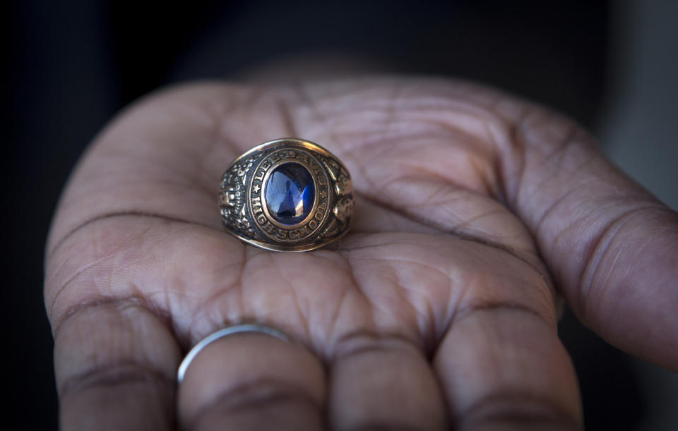 MECHANICSVILLE, VA - MARCH 3, 2018: Nannie R. Davis, 68, holds her class ring from Lee-Davis High School where she graduated from in 1967, in Mechanicsville, Virginia on March 3, 2018. The ring features like likeness of Robert E. Lee and Jefferson Davis and has a confederate flag. Davis wants to see the name of the high school changed. (Photo by Julia Rendleman for the Washington Post)