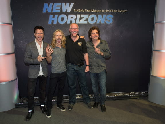 Styx band members share laughs with the scientist who discovered Styx, a moon of Pluto. Left to right: Lawrence Gowan, Tommy Shaw, New Horizons' Mark Showalter, and Todd Sucherman