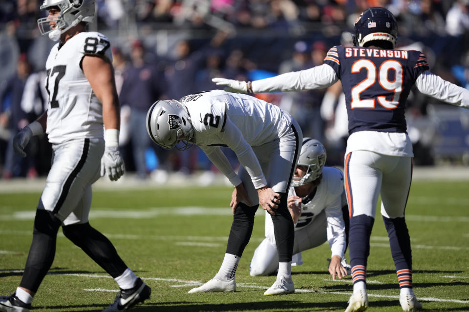 Las Vegas Raiders place kicker Daniel Carlson (2) reacts to missing a 41-yard field goal against the Chicago Bears in the first half of an NFL football game, Sunday, Oct. 22, 2023, in Chicago. (AP Photo/Charles Rex Arbogast)