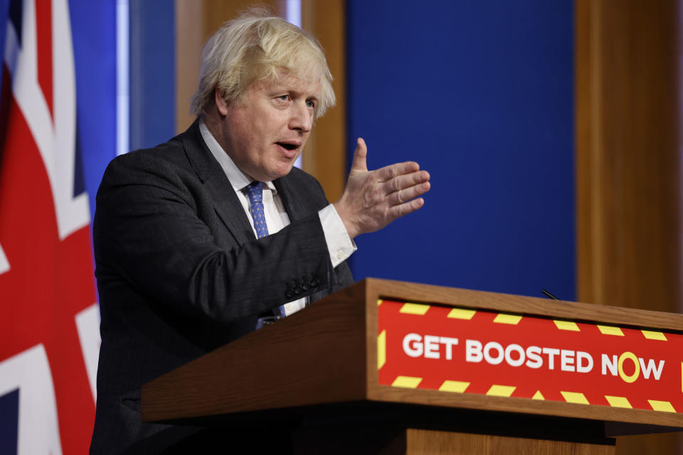 Britain's Prime Minister Boris Johnson speaks during a media briefing on COVID-19, in Downing Street, London, Wednesday Dec. 15, 2021. (Tolga Akmen/Pool via AP)