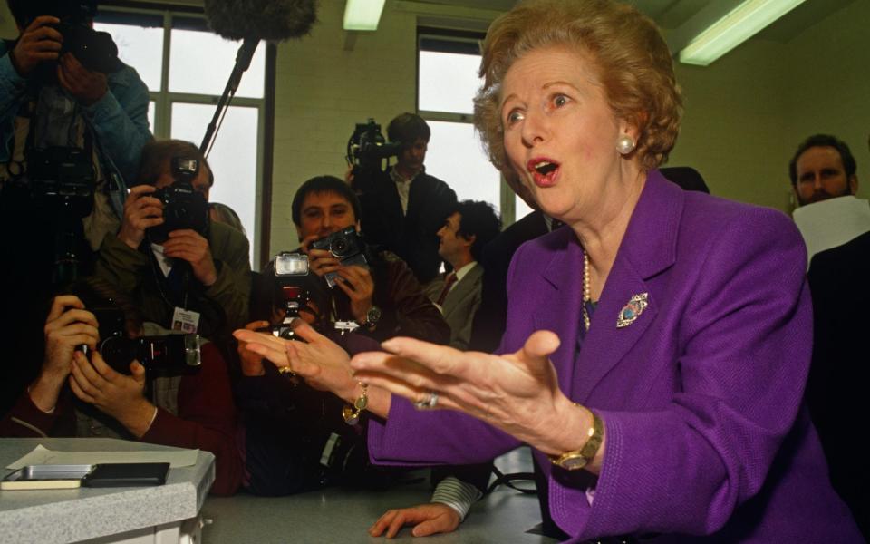 Margaret Thatcher with her signature jewellery uniform in 1992 - Richard Baker/ Pictures Ltd./Corbis via Getty Images