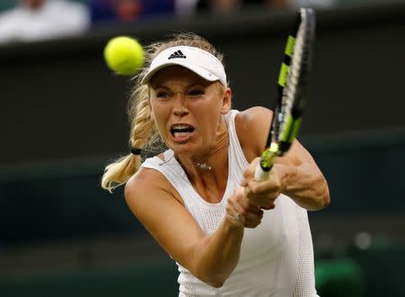 Britain Tennis - Wimbledon - All England Lawn Tennis & Croquet Club, Wimbledon, England - 28/6/16 Denmark's Caroline Wozniacki in action during her match against Russia's Svetlana Kuznetsova REUTERS/Stefan Wermuth