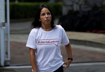 Oriette Schadendorf Capriles, stepdaughter of opposition leader Antonio Ledezma, talks to reporters outside their home in Caracas, Venezuela August 4, 2017. REUTERS/Marco Bello