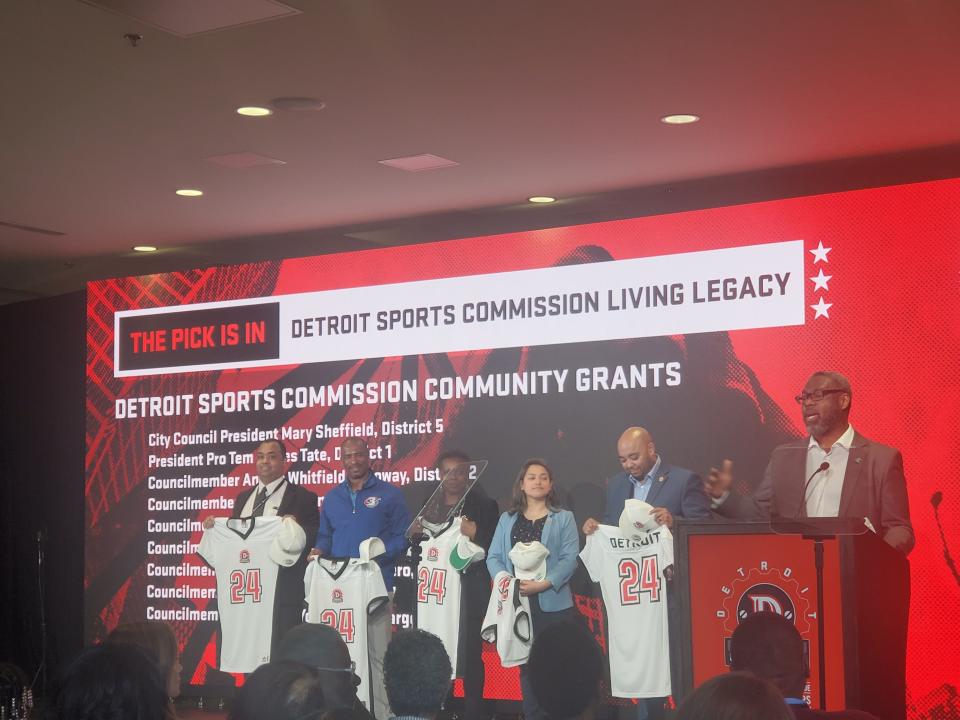 Detroit City Council President Pro Tem James Tate speaks at the April 22 Community Impact Draft at The Corner Ballpark in Detroit while Councilmembers Coleman Young II, Scott Benson, Mary Waters, Gabriela Santiago-Romero and Fred Durhal III listen.