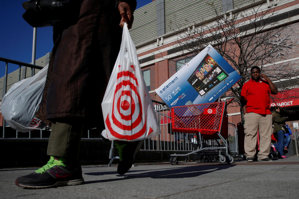 Shoppers exit a Target store during Black Friday shopping in the Brooklyn borough of New York City, U.S., November 24, 2017. REUTERS/Brendan McDermid