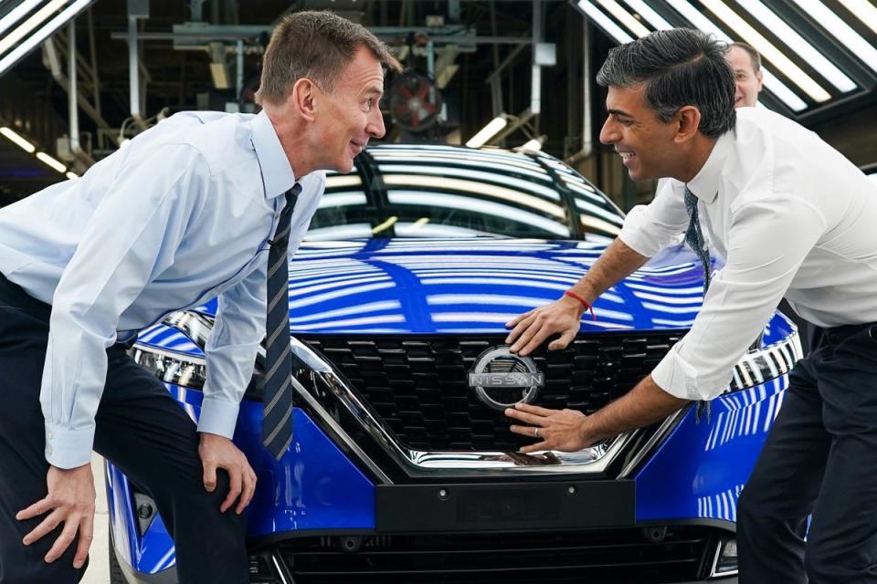 Chancellor Jeremy Hunt and Rishi Sunak had been pushing for delay to car tariffs (Getty)