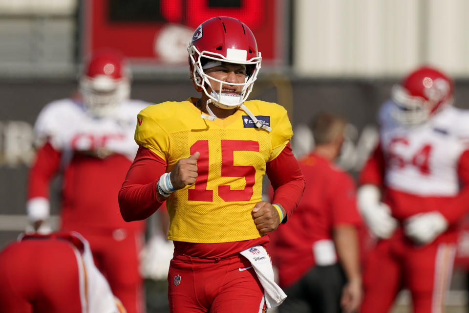 Kansas City Chiefs quarterback Patrick Mahomes runs during an NFL football training camp practice Monday, Aug. 24, 2020, in Kansas City, Mo. (AP Photo/Charlie Riedel)