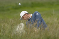 Justin Rose, of England, hits out of a bunker on the third hole during the third round of the U.S. Open golf tournament Saturday, June 15, 2019, in Pebble Beach, Calif. (AP Photo/Matt York)