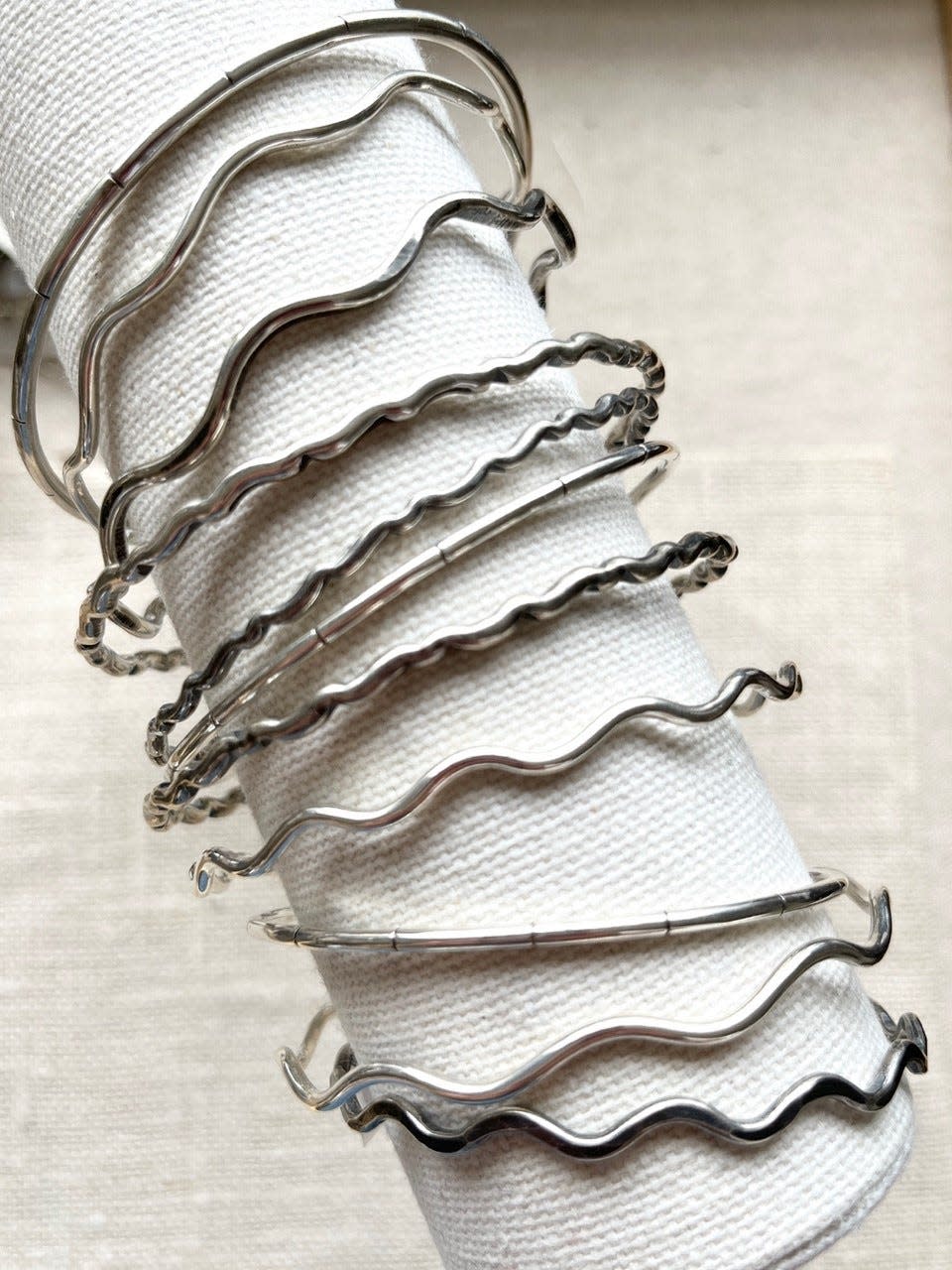Wave bangles by Falmouth silversmith Laura Bouton.