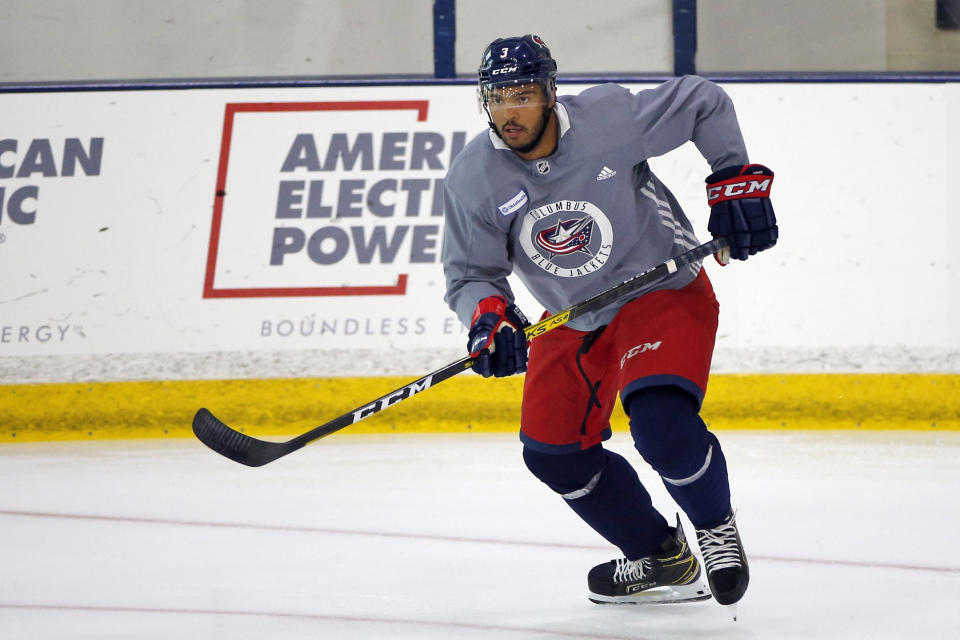 FILE - In this July 20, 2020, file photo, Columbus Blue Jackets' Seth Jones skates during the NHL hockey team's practice in Columbus, Ohio. Jones, Pittsburgh forward Jake Guentzel and Tampa Bay captain Steven Stamkos would’ve missed some or all of the playoffs if they started in April. Instead, the silver lining of the COVID-19 pandemic halting the season is those players are healthy and ready to contribute. (AP Photo/Jay LaPrete, File)