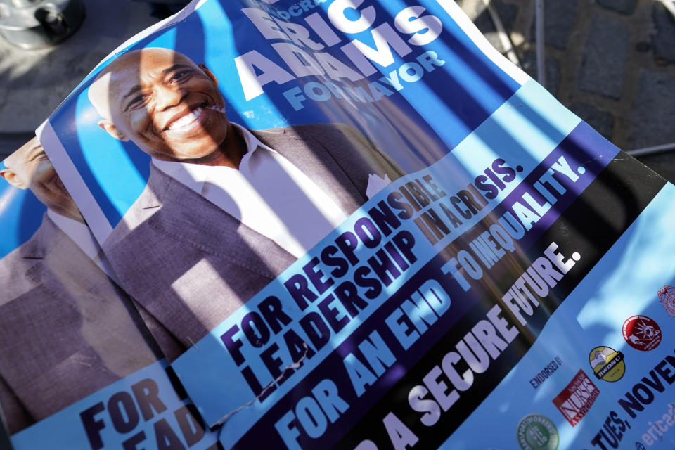 A poster for Democrat candidate for New York Mayor, Eric Adams is displayed at campaign event, Tuesday, Oct. 19, 2021, in New York. (AP Photo/Mary Altaffer)