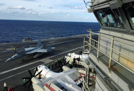 U.S. Navy aircraft carrier USS Ronald Reagan conducts military drills during Keen Sword, a joint field-training exercise involving U.S. military, Japan Maritime Self-Defense Force personnel and Royal Canadian Navy, at sea November 3, 2018. REUTERS/Tim Kelly