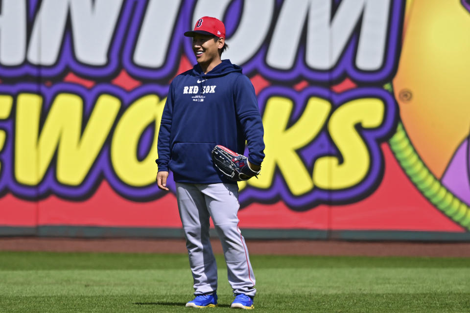 Boston Red Sox's Masataka Yoshida warms up before a baseball game against the Cleveland Guardians, Thursday, April 25, 2024, in Cleveland. (AP Photo/David Dermer)